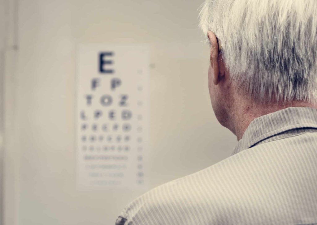 An older patient having their eyesight tested